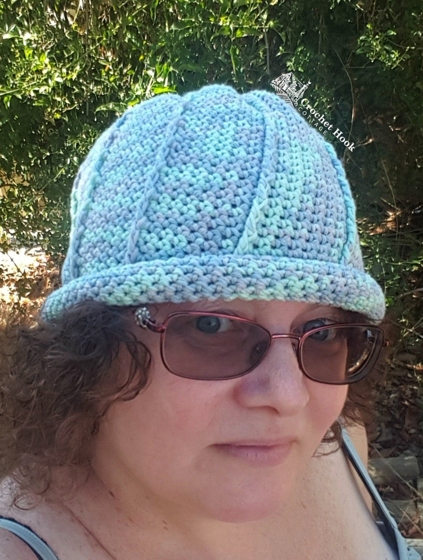 Person wearing the Rolled Brim Slouchy Beanie, 2 styles in 1 convertible beanie in the Alexandra colour with the brim rolled up - www.crochethookcottage.com