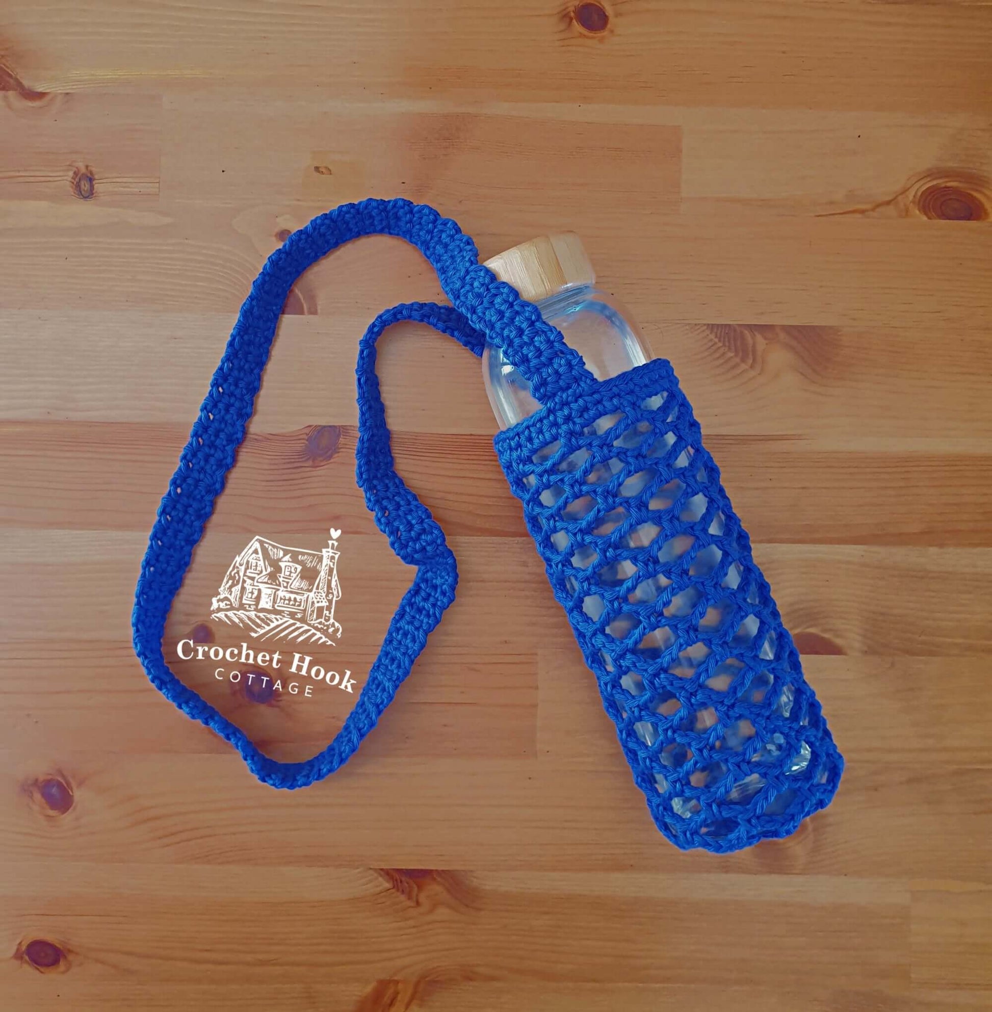 Royal Blue Bottle Holder, hands free drink bottle bag with shoulder strap, crocheted in 100% cotton yarn, mesh net design with shoulder strap