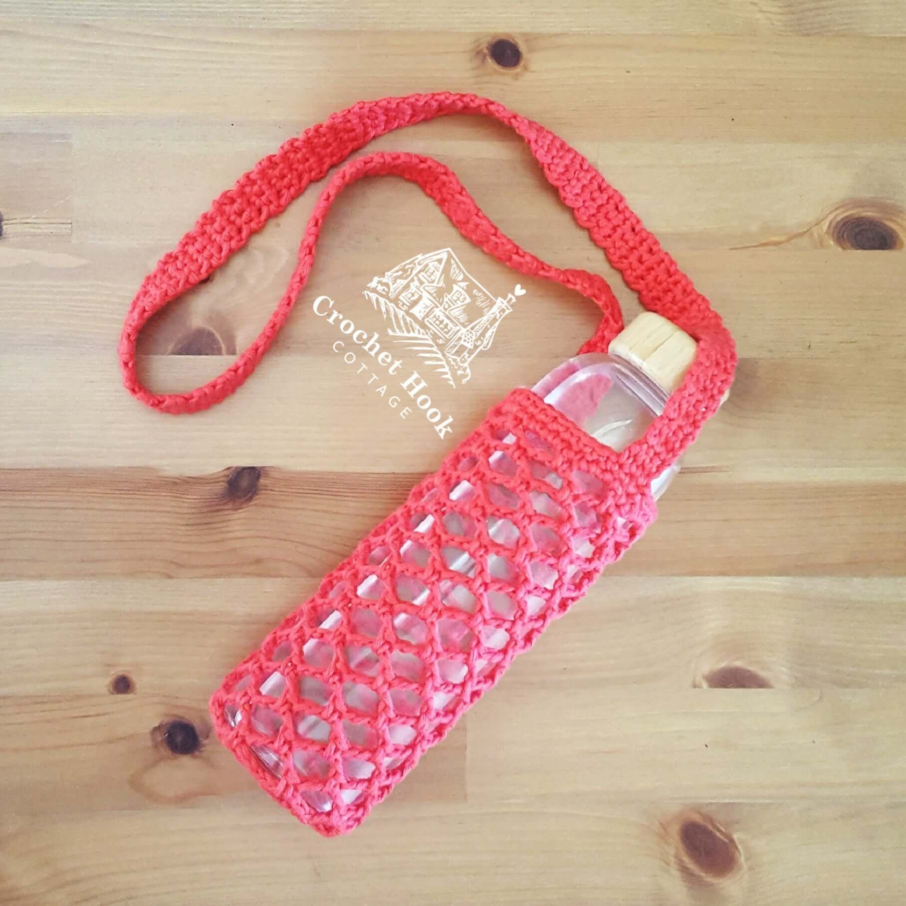 Red Bottle Holder, hands free drink bottle bag with shoulder strap, crocheted in 100% cotton yarn, mesh net design with shoulder strap