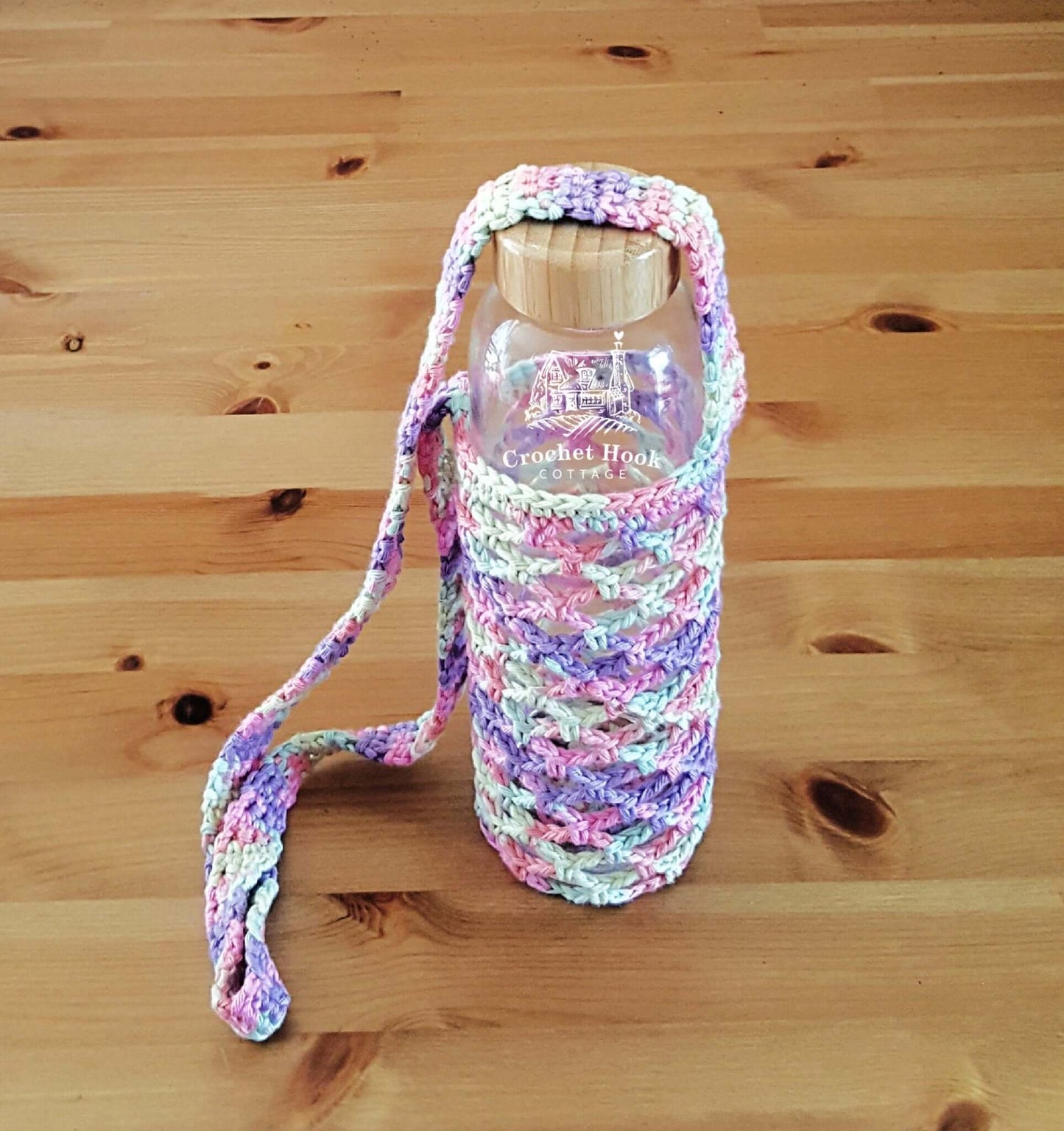 Camilla colour blend Bottle Holder, hands free drink bottle bag with shoulder strap, crocheted in 100% cotton yarn, mesh net design with shoulder strap