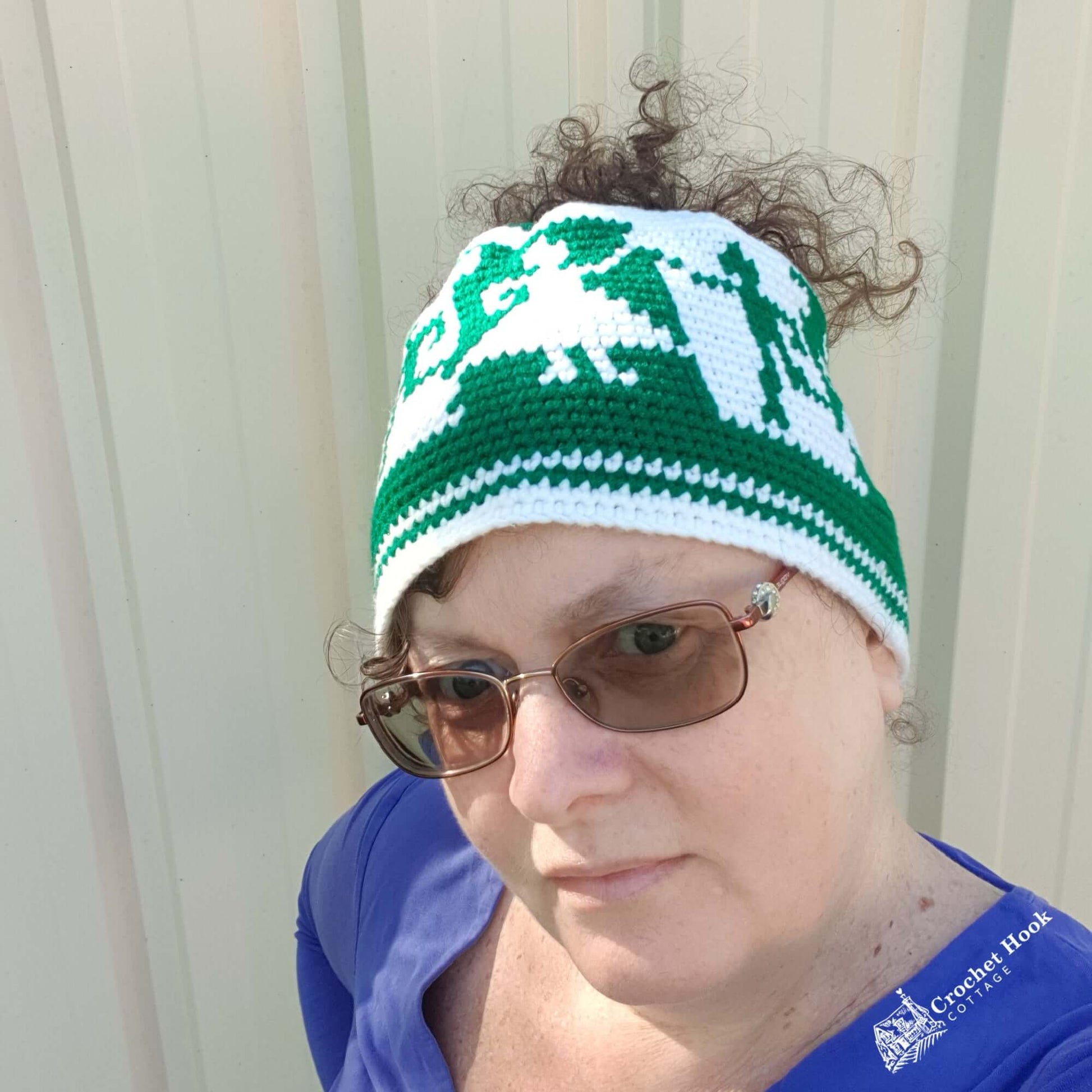 Emerald Green & Off-White Messy Bun Character Beanie - www.crochethookcottage.com