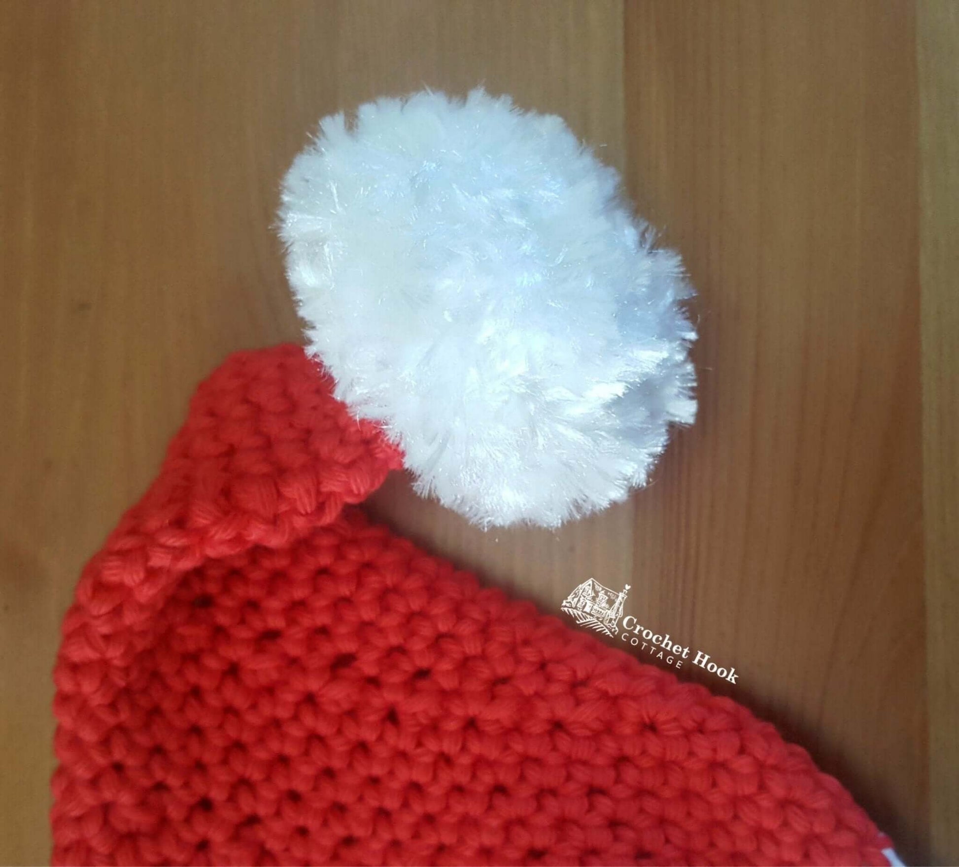 LIMITED EDITION - Crochet Santa Hat with Faux Fur Pom Pom, in five sizes, a size to fit every age! - www.crochethookcottage.com