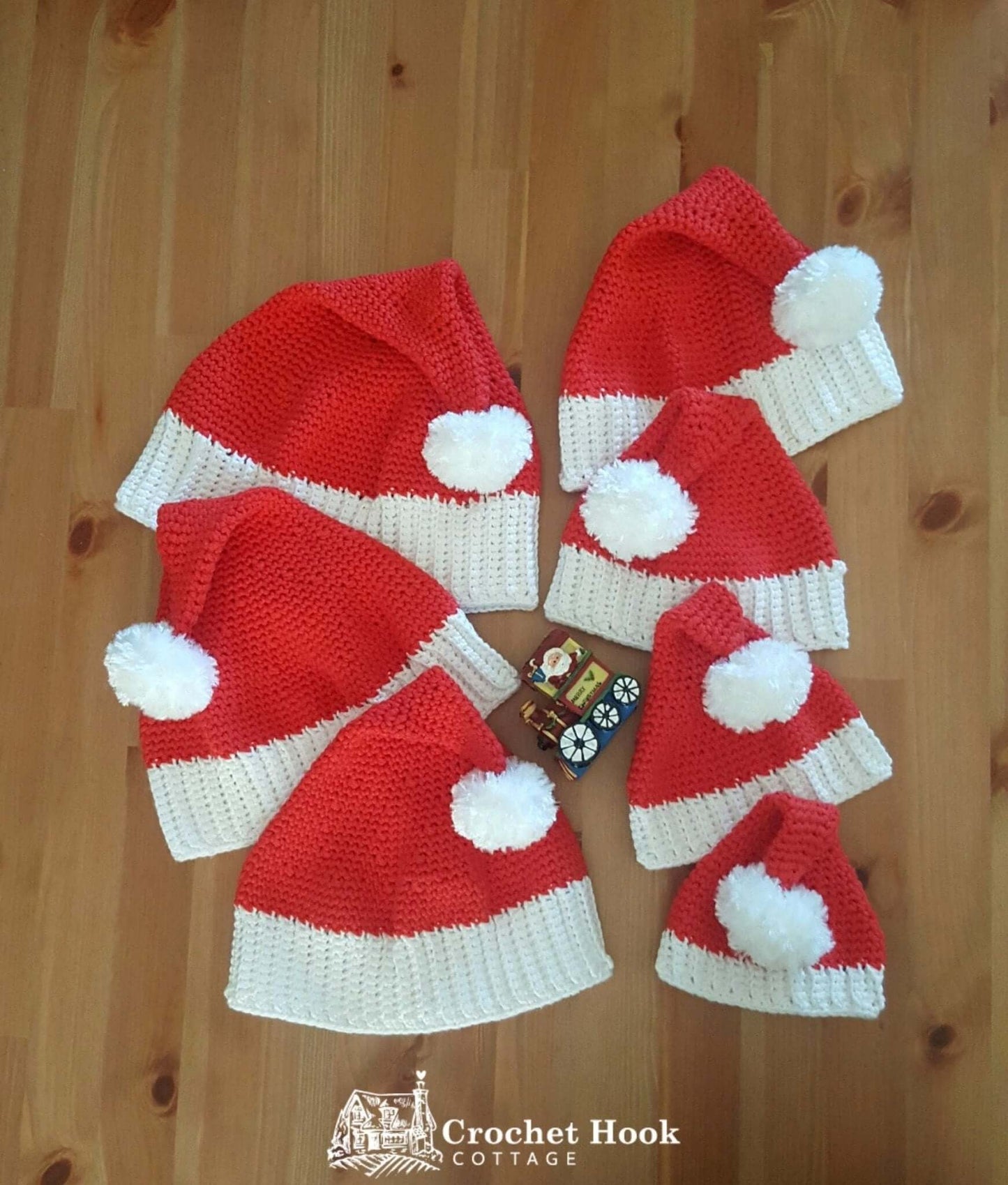 LIMITED EDITION - Crochet Santa Hat with Faux Fur Pom Pom, in five sizes, a size to fit every age! - www.crochethookcottage.com