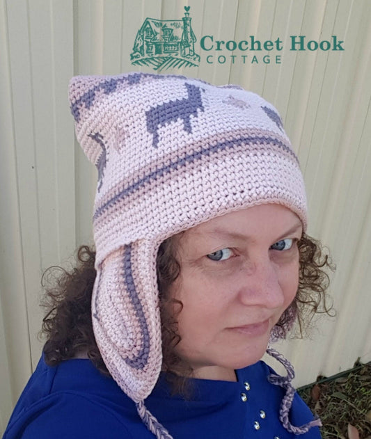 side view of a person wearing the Pink Peruvian Llama Chullo - www.crochethookcottage.com