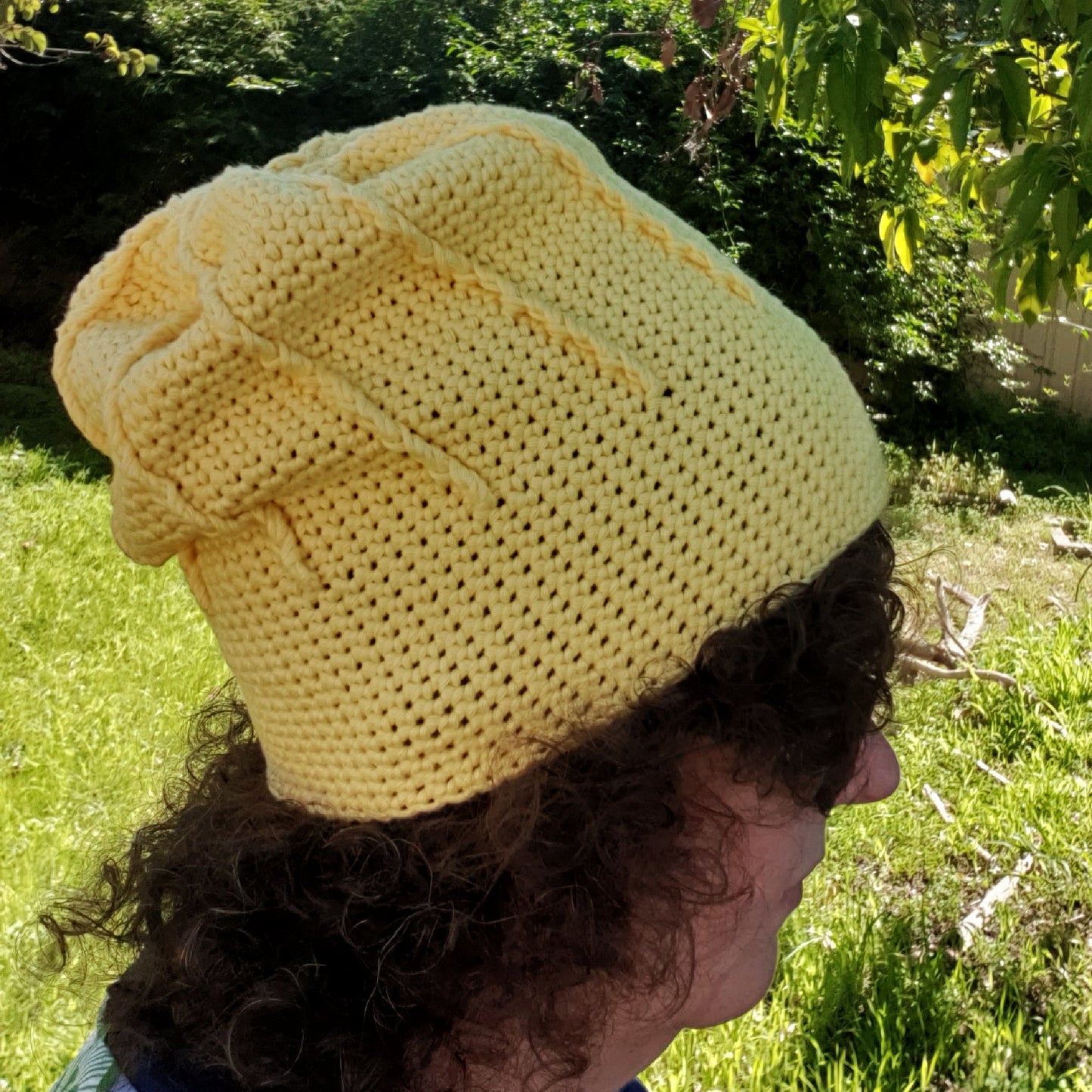 Yellow Rolled Brim Slouchy Beanie, 2 styles in 1 convertible beanie, worn slouchy style side view - www.crochethookcottage.com