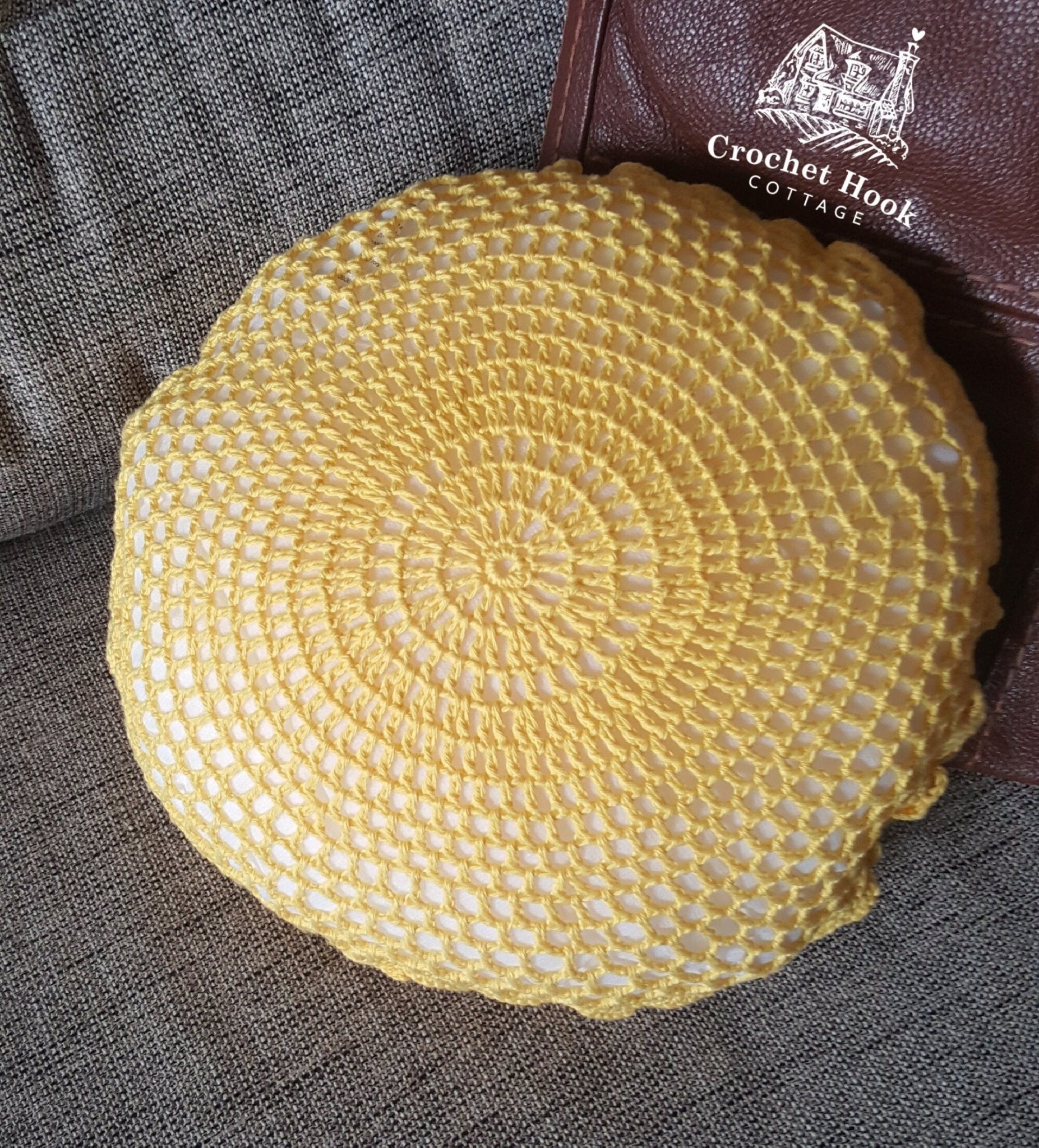 back view showing open lacework in the form of concentric circles, Yellow Round Petal Cushion Cover with cushion inserted - www.crochethookcottage.com